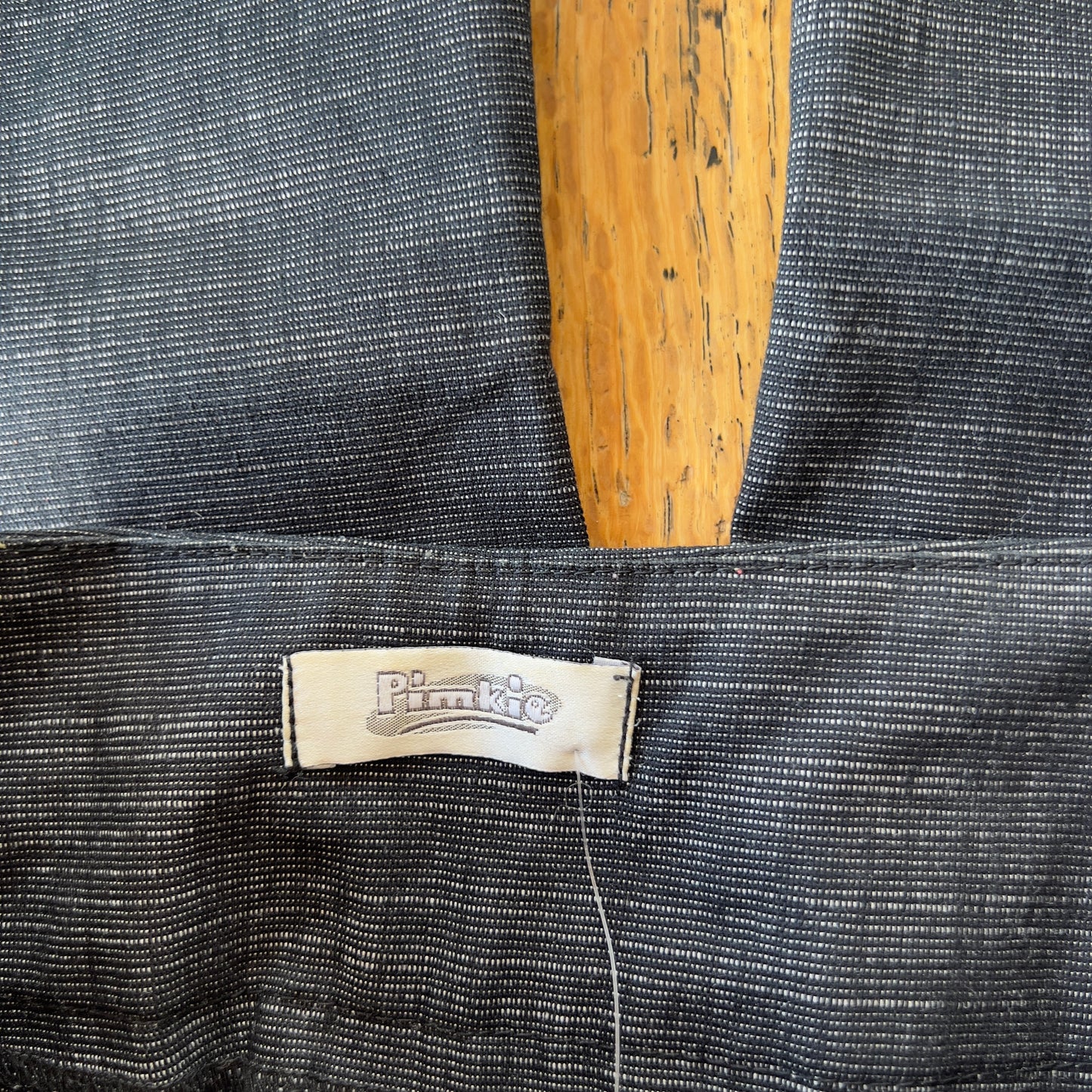 dark grey flared trousers
