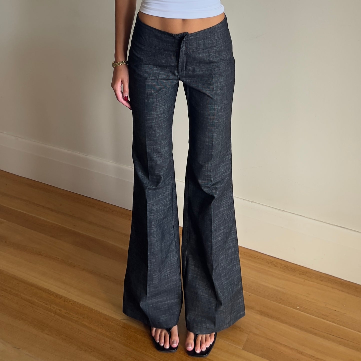 dark grey flared trousers
