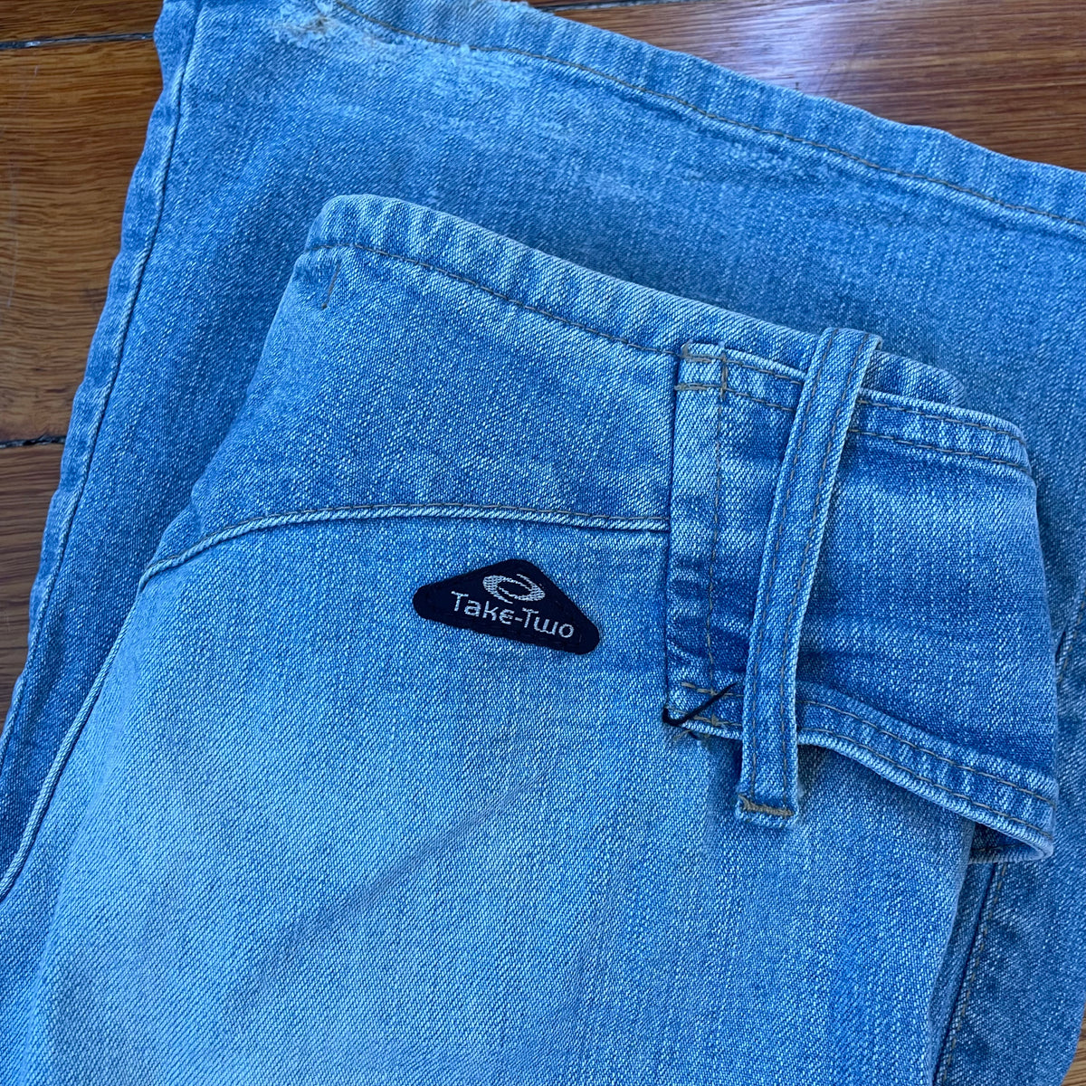 low rise bootcut belt jeans