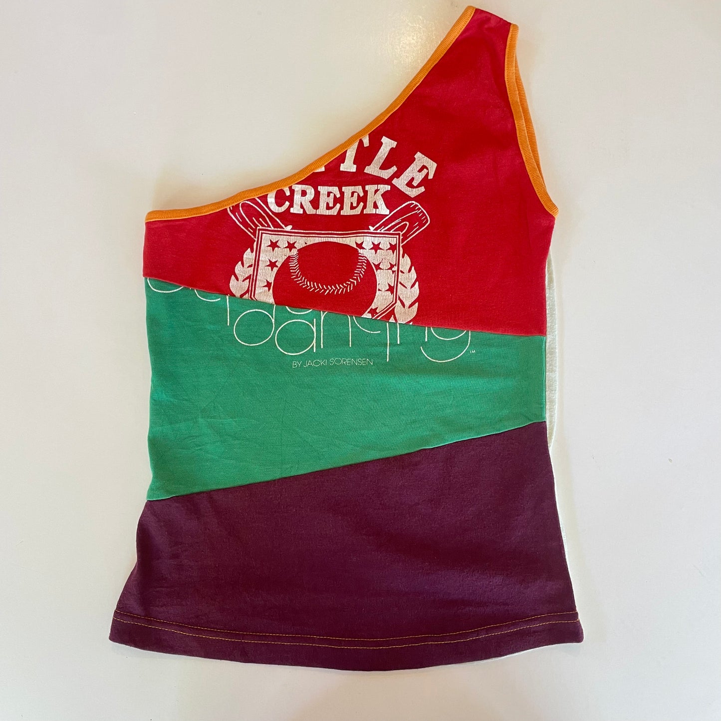 one-shoulder graphic tank