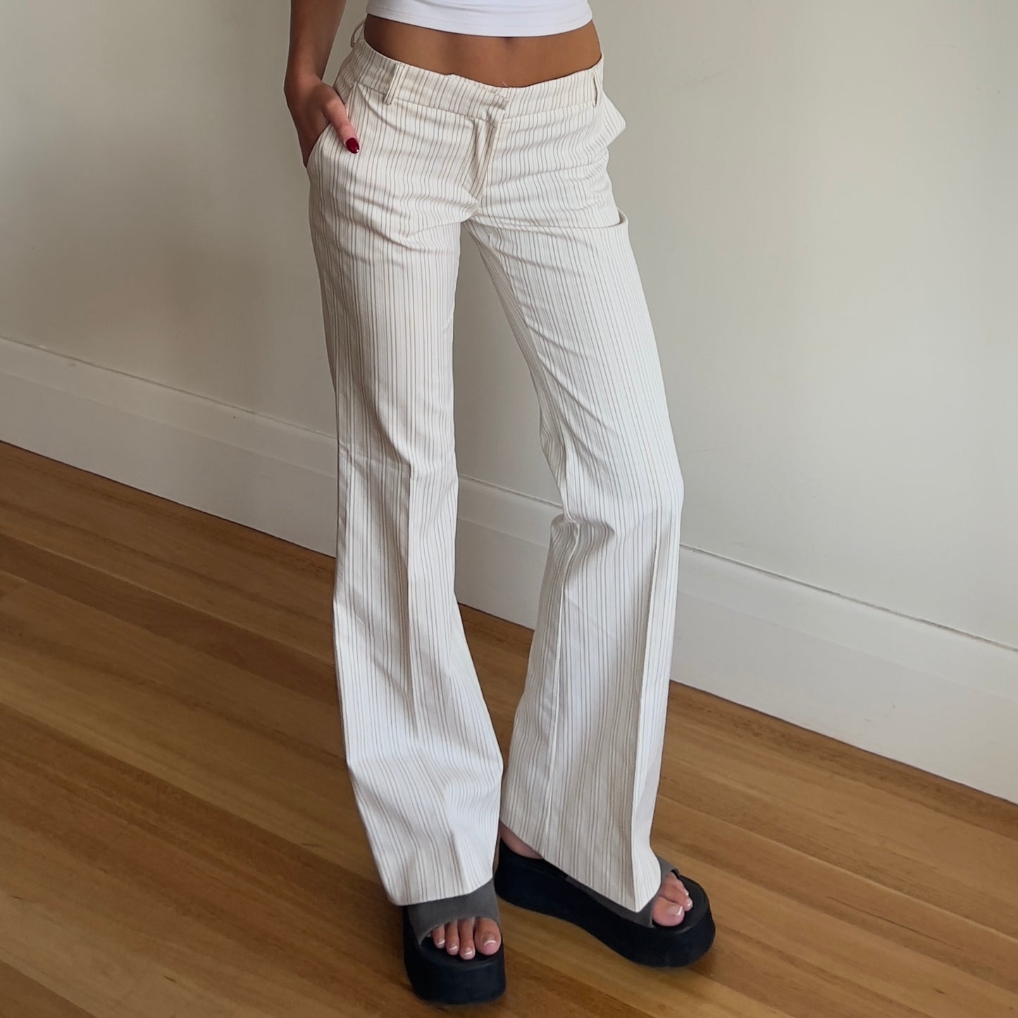 white pinstripe trousers