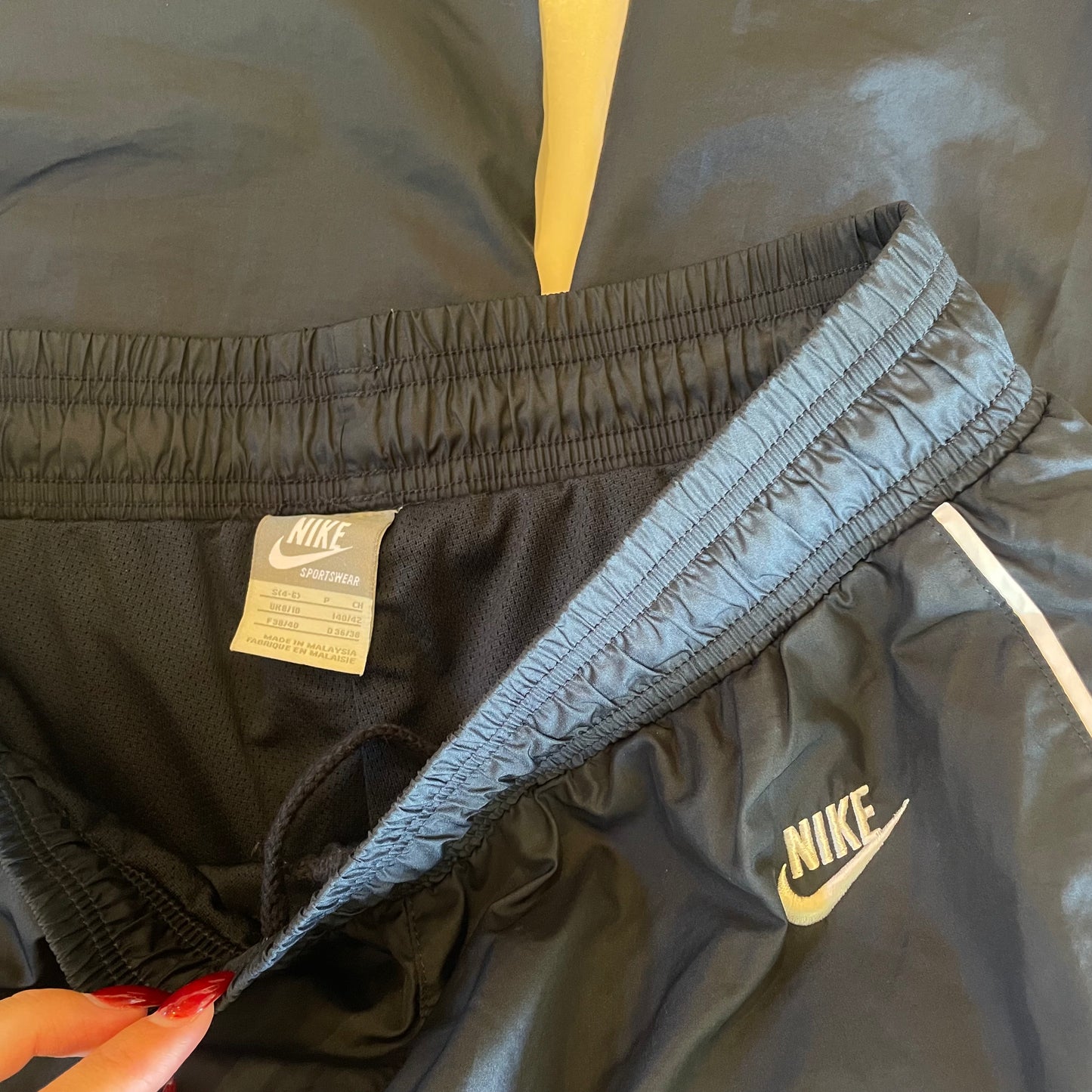navy Nike spray/trackpants