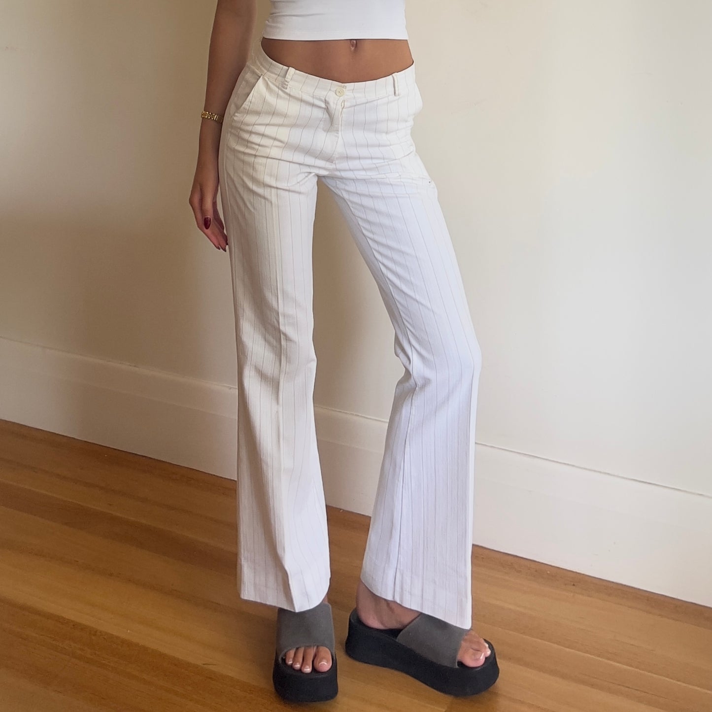 white pinstripe trousers