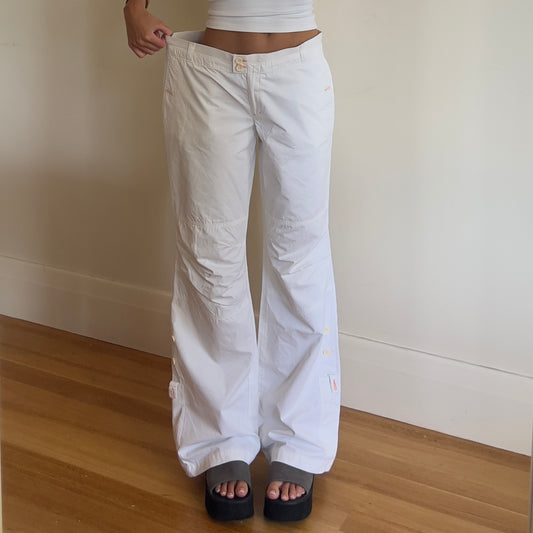 baggy white North Sails pants