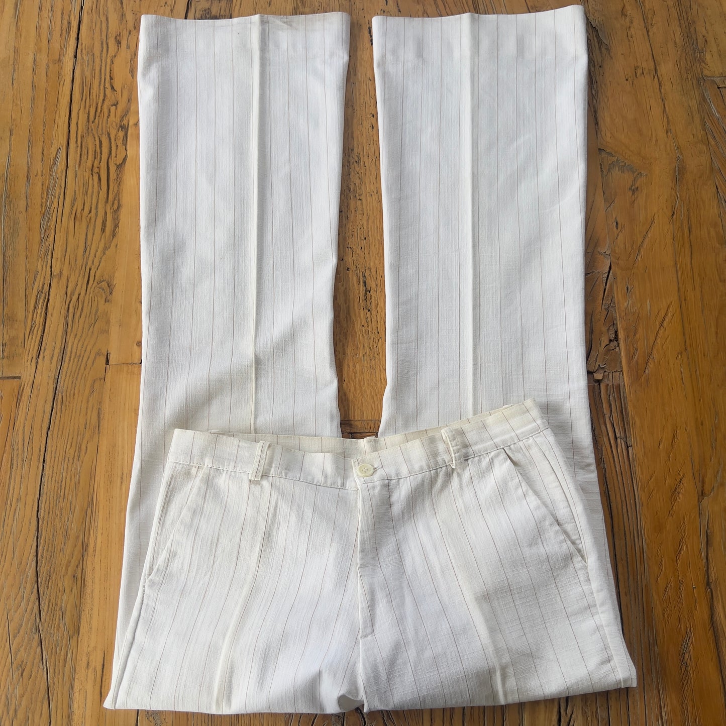white pinstripe trousers