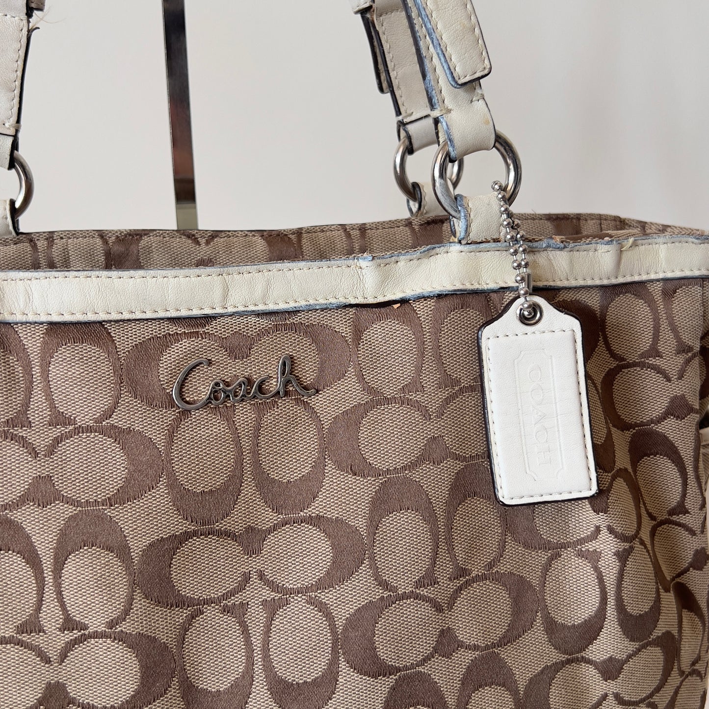 white signature Coach tote bag