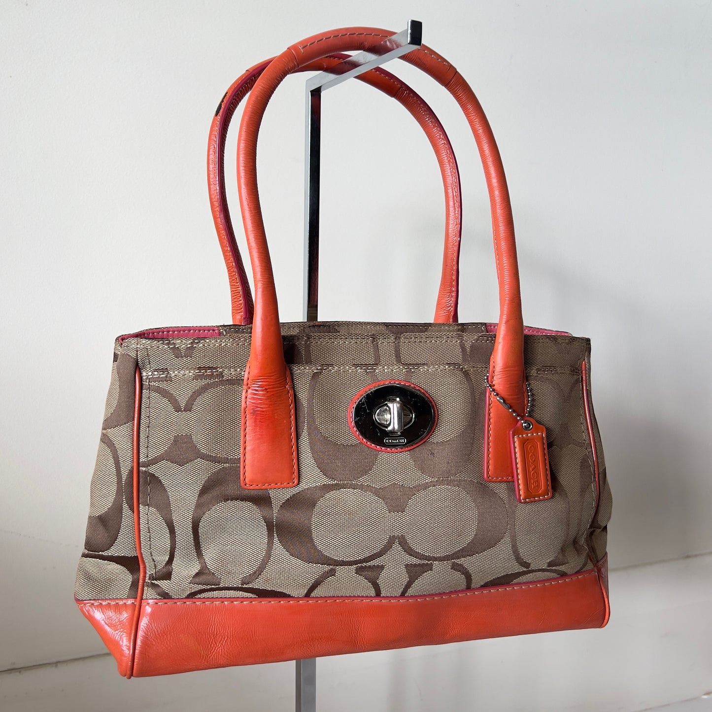 orange signature Coach bag