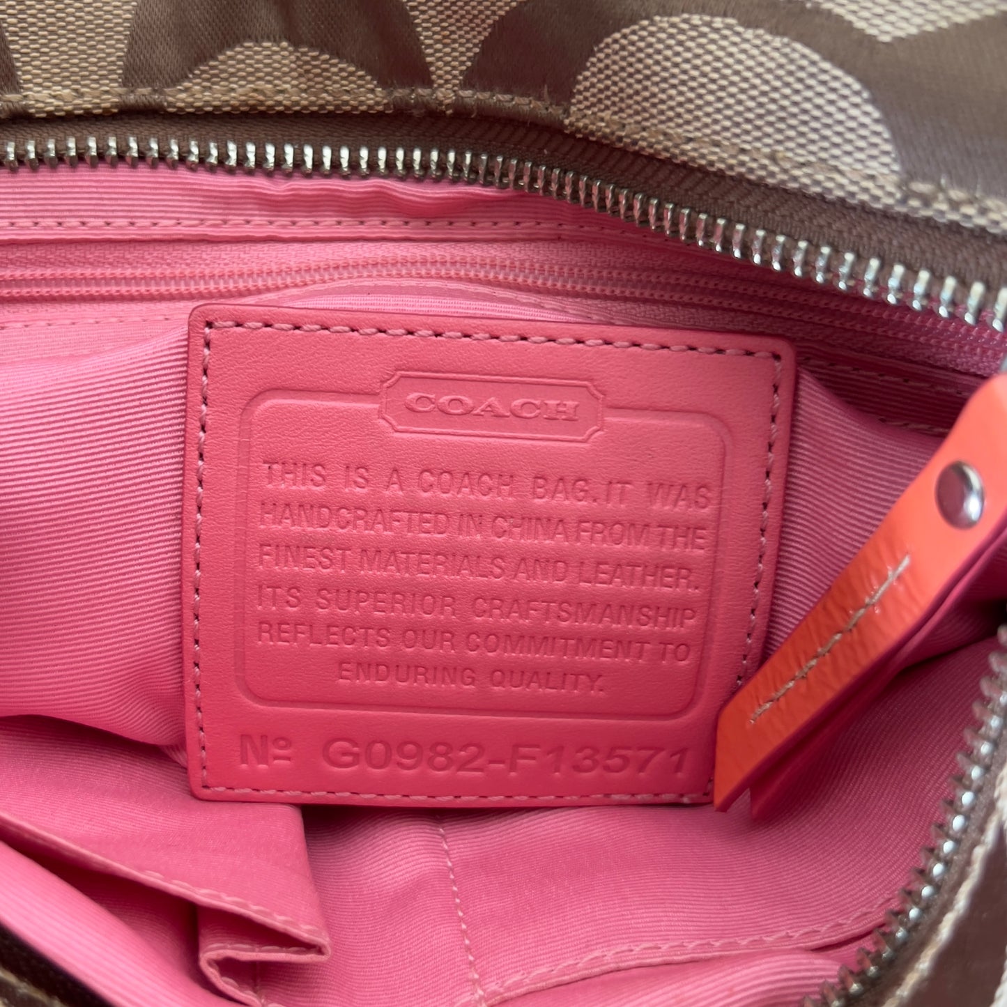 orange signature Coach bag