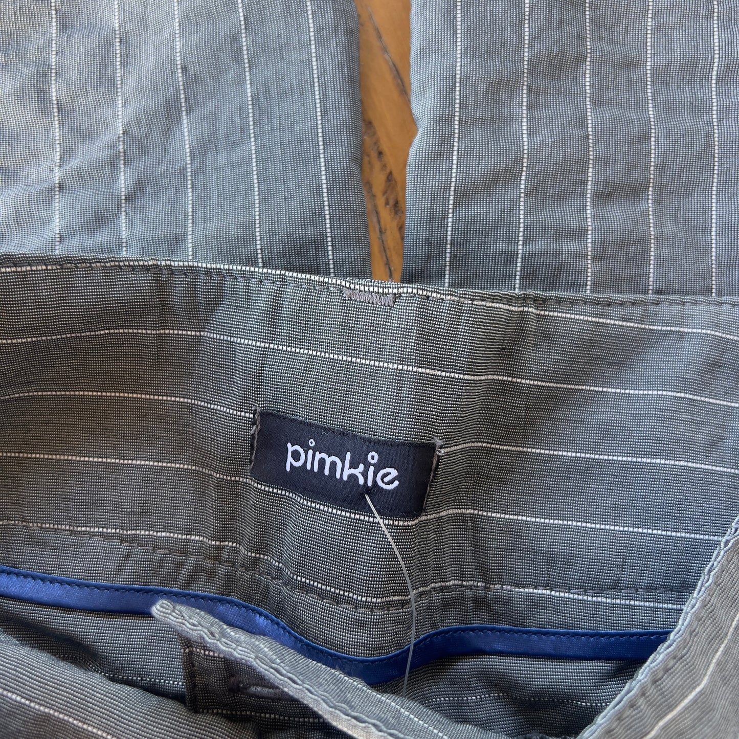 grey pinstripe trousers