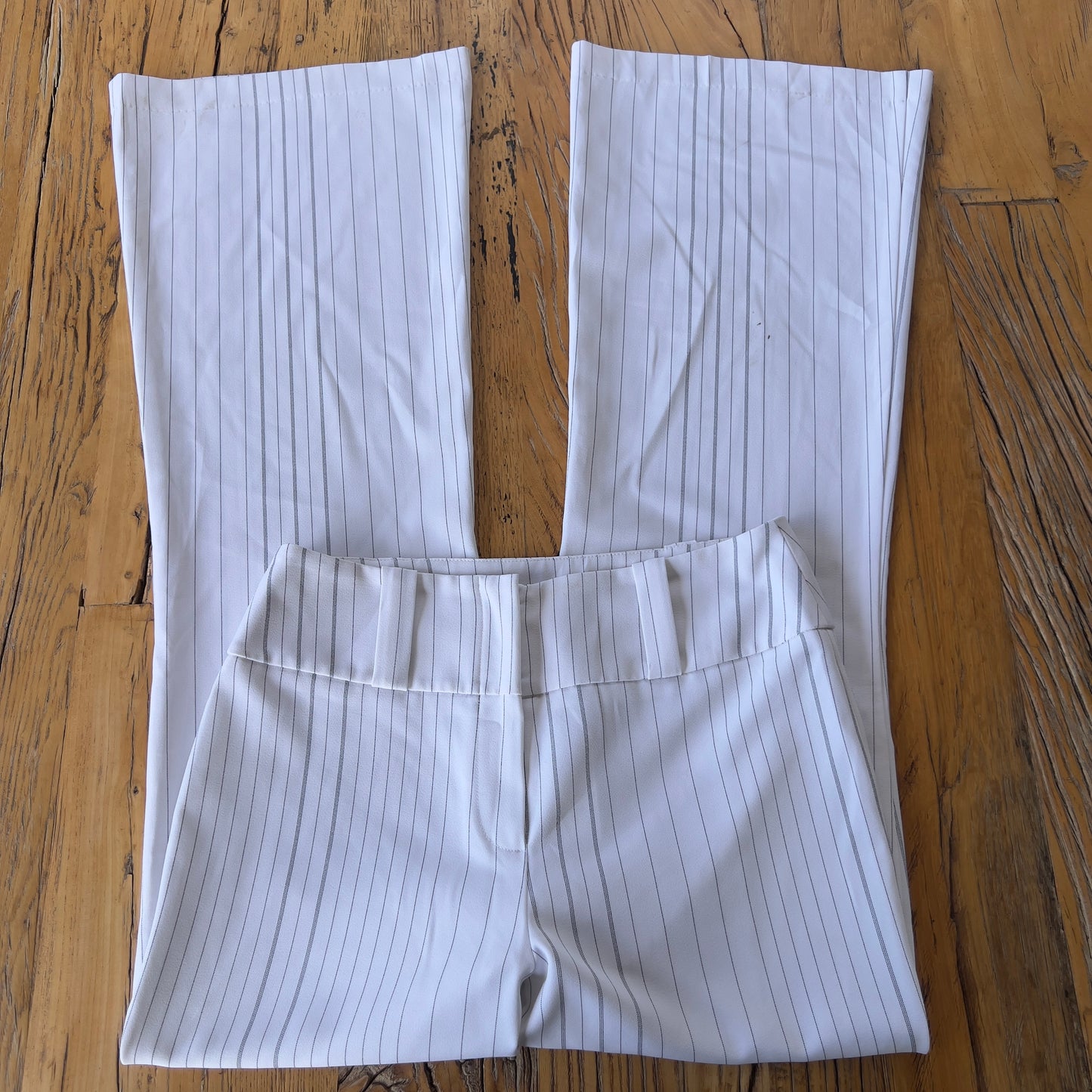 white pinstripe trousers