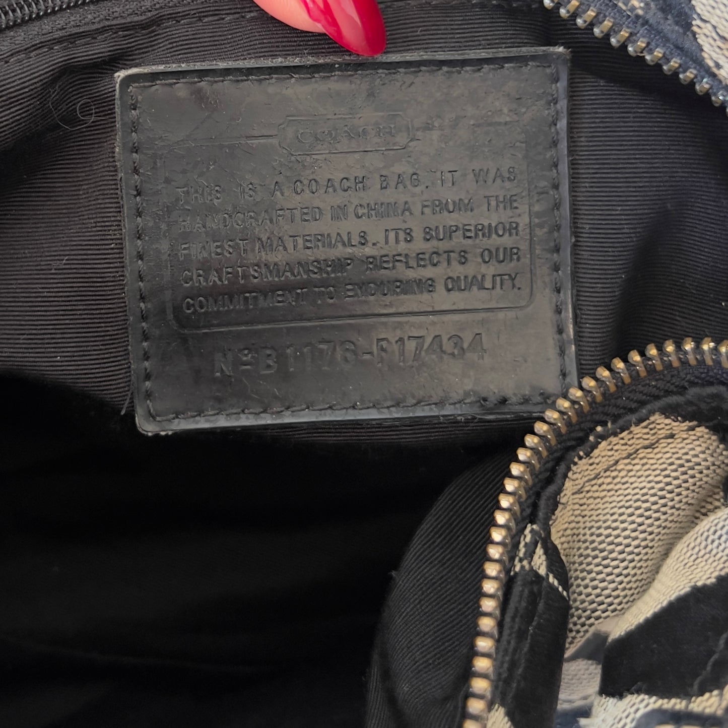black signature Coach hobo bag
