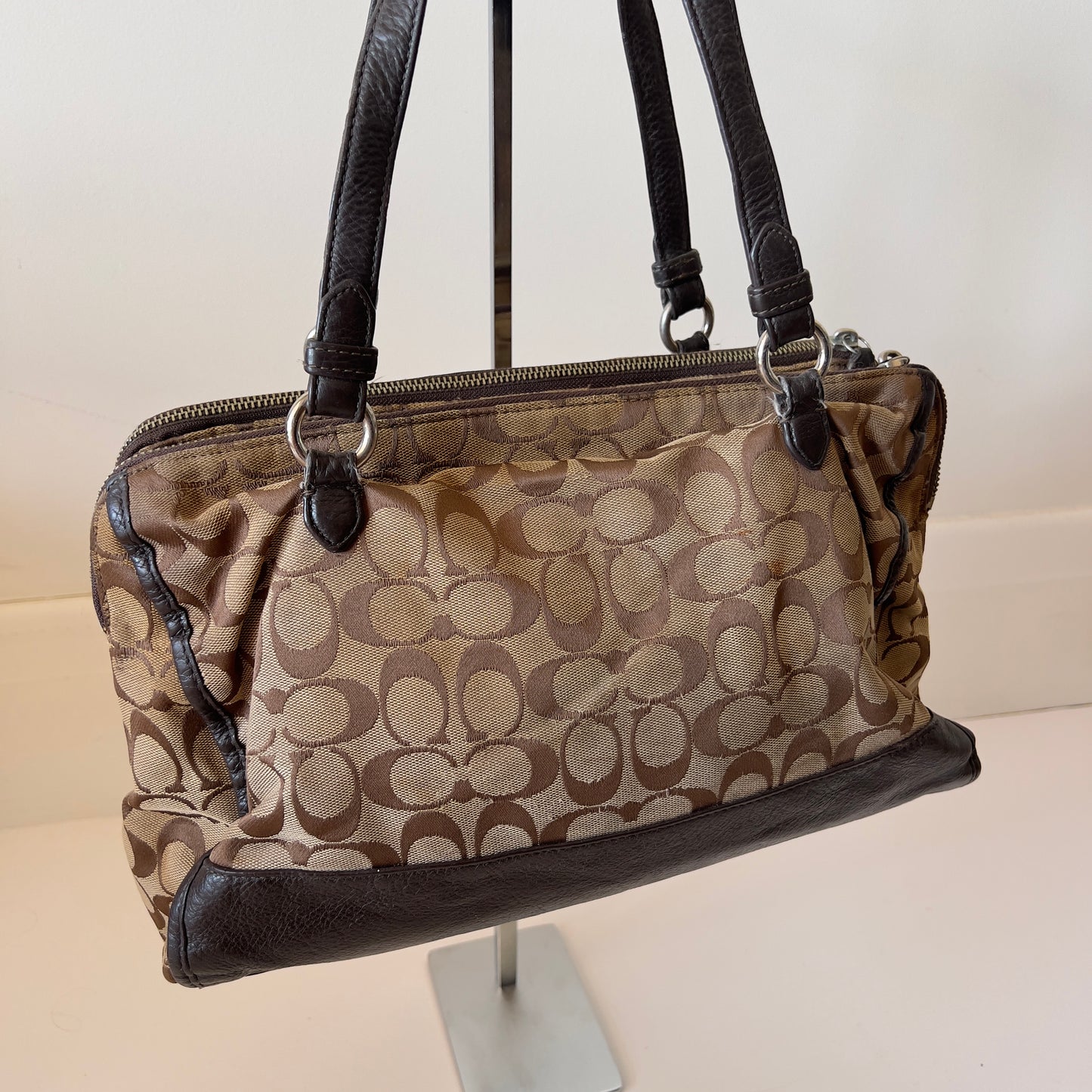 brown signature Coach bag