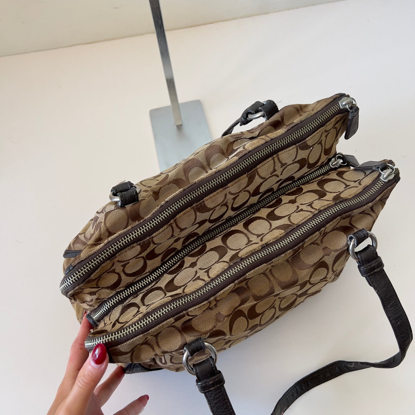 brown signature Coach bag