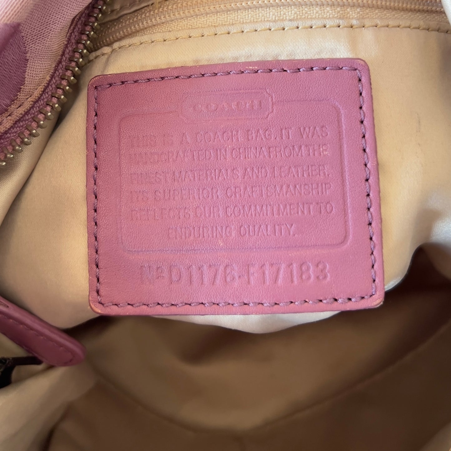 purple signature Coach bag