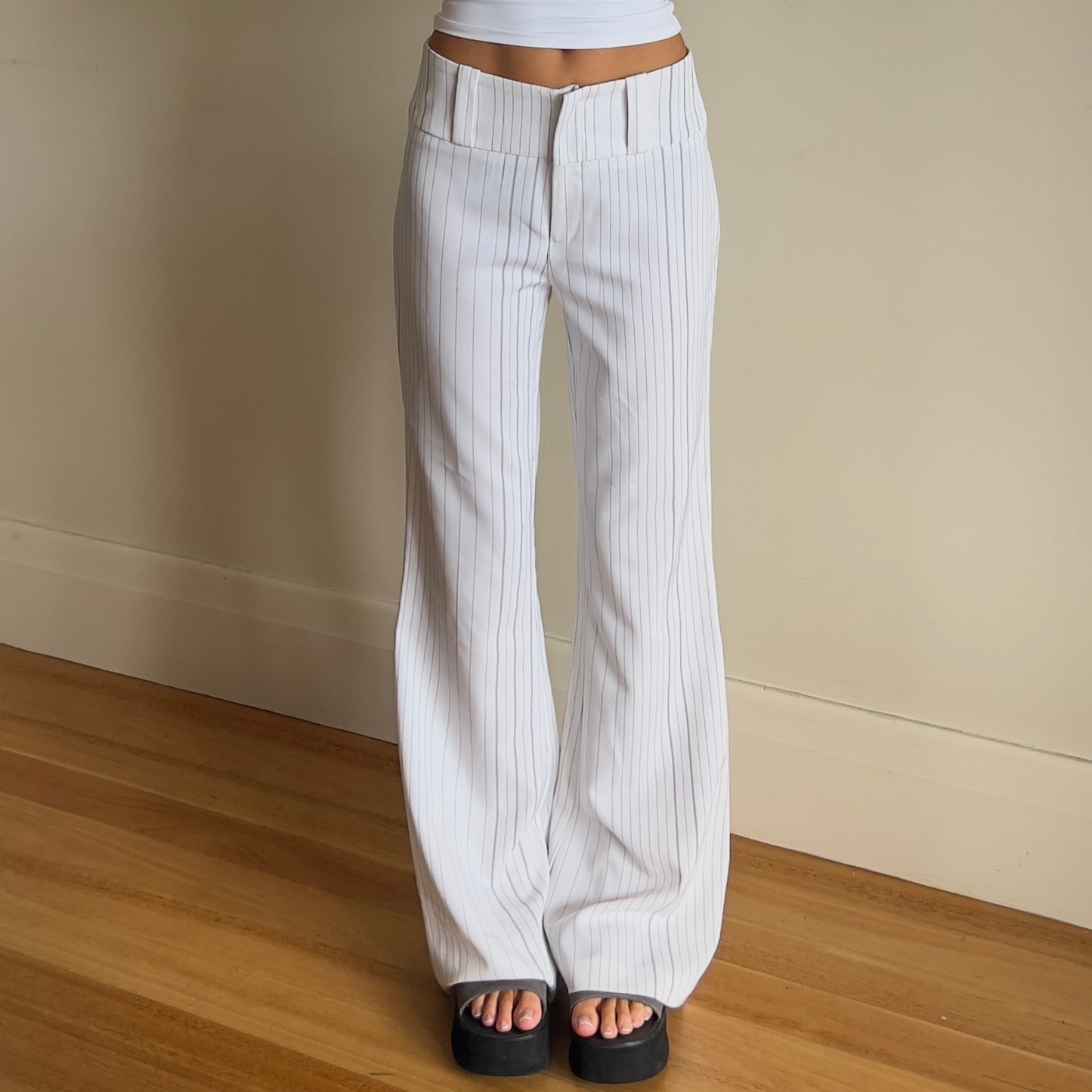 white pinstripe trousers