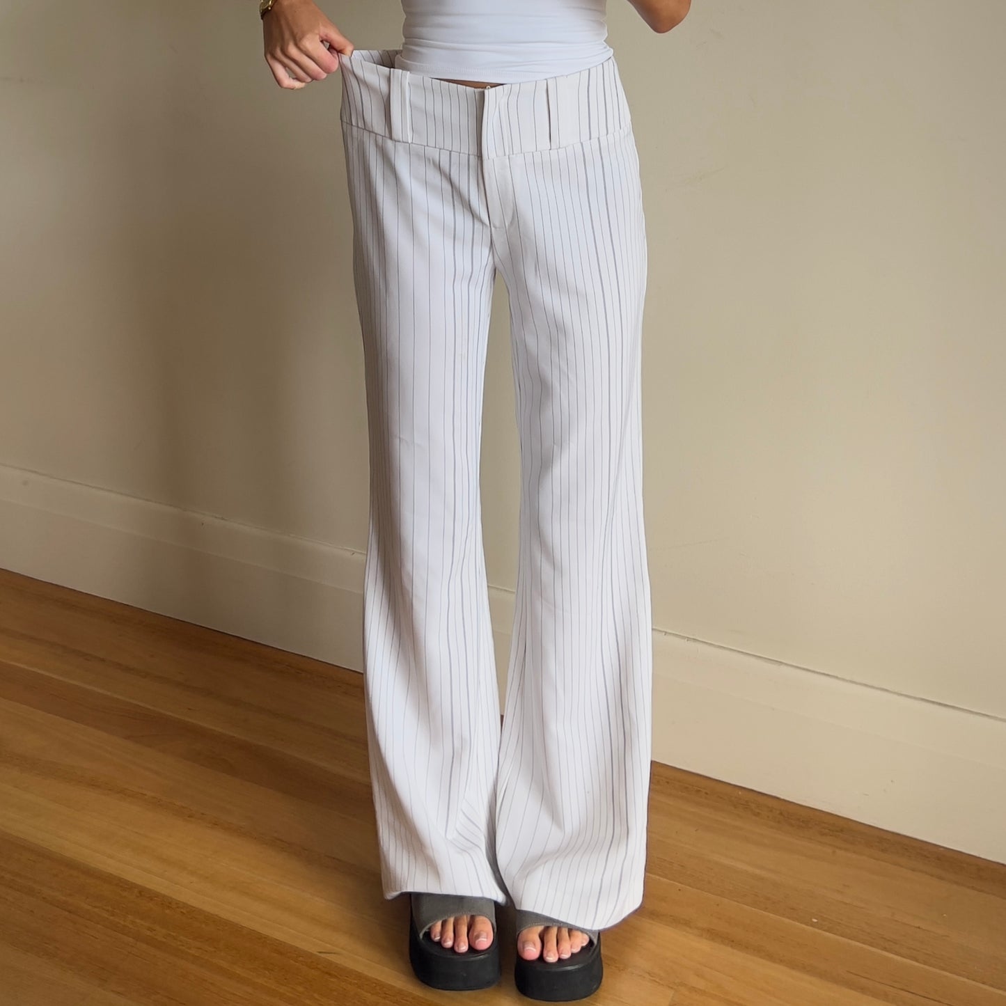 white pinstripe trousers