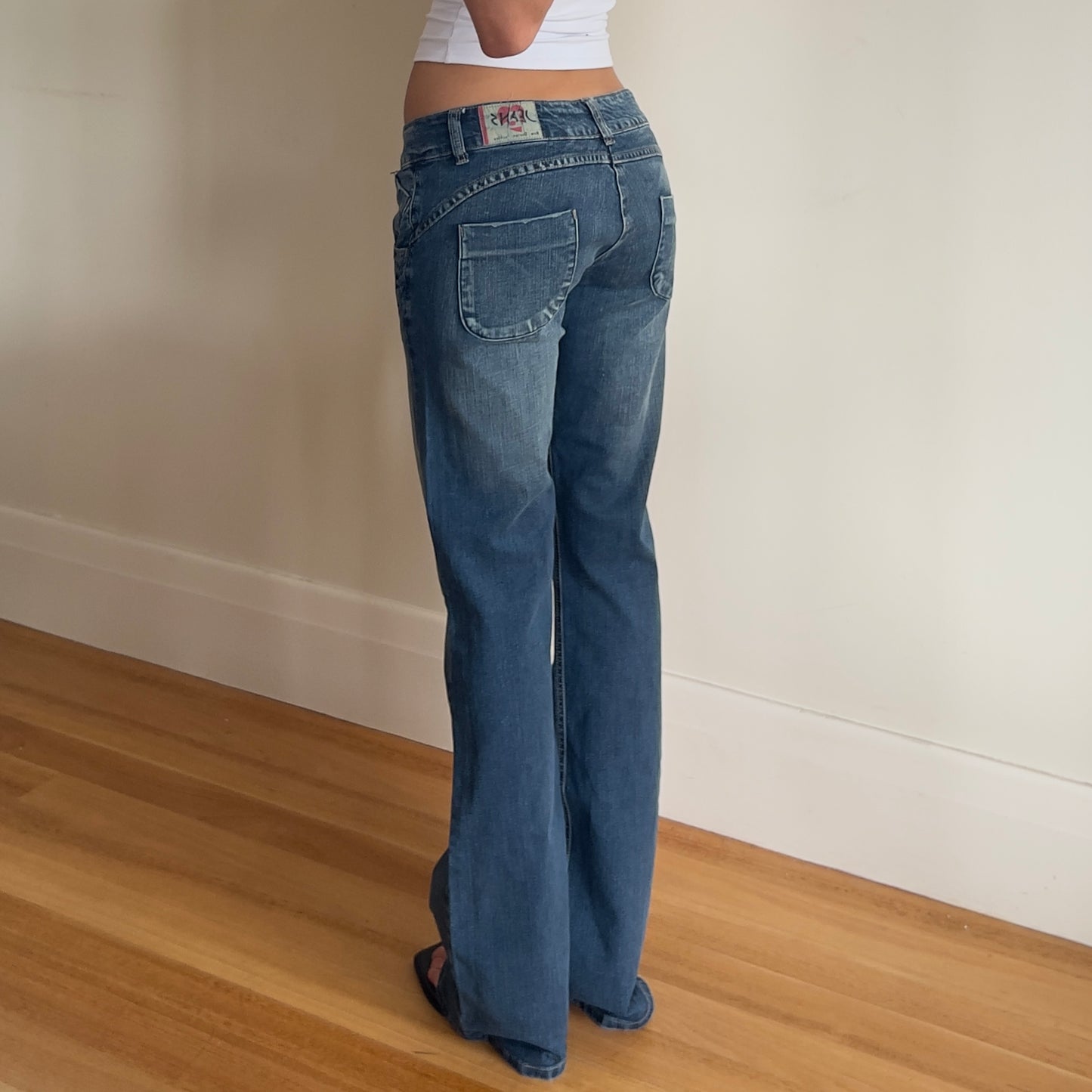 low rise flared denim jeans