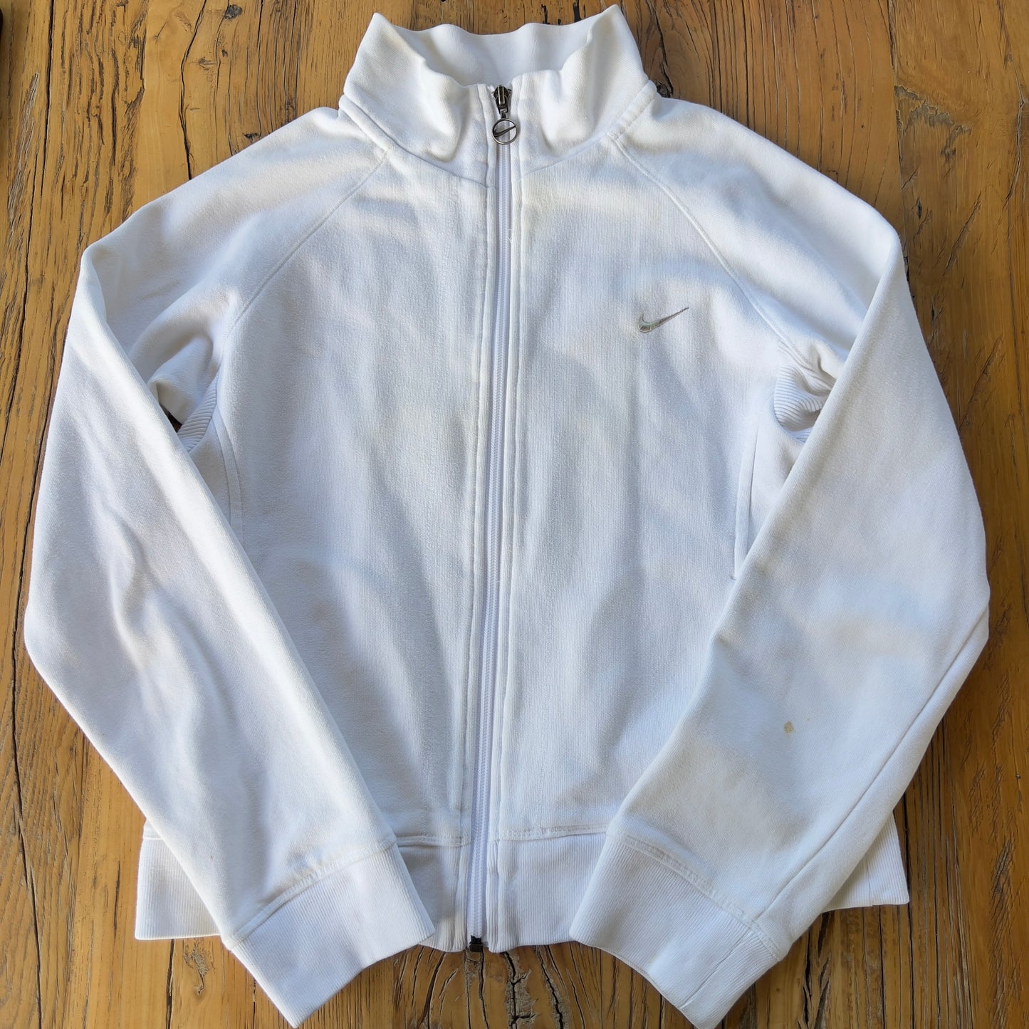 white 2000s Nike zip-up jacket