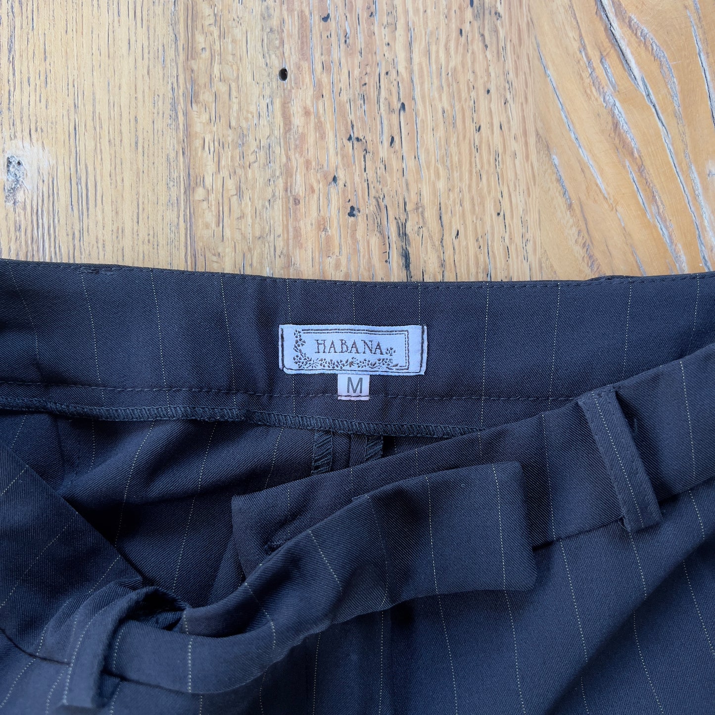 black pinstripe trousers