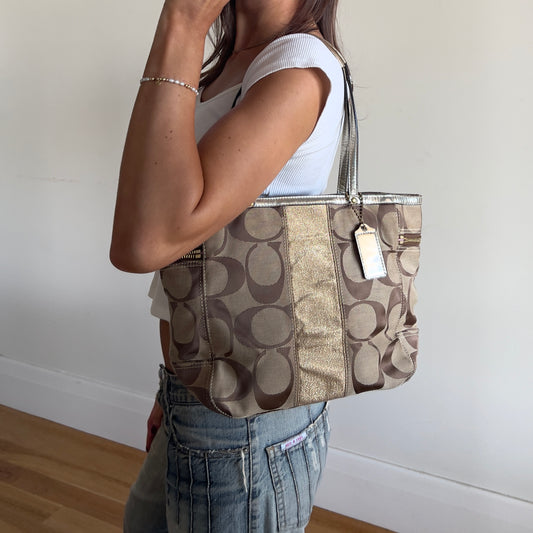gold signature Coach bag