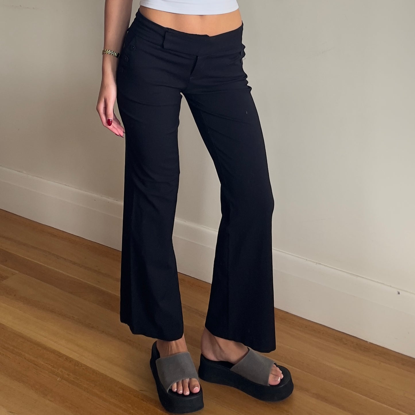 black low rise trousers
