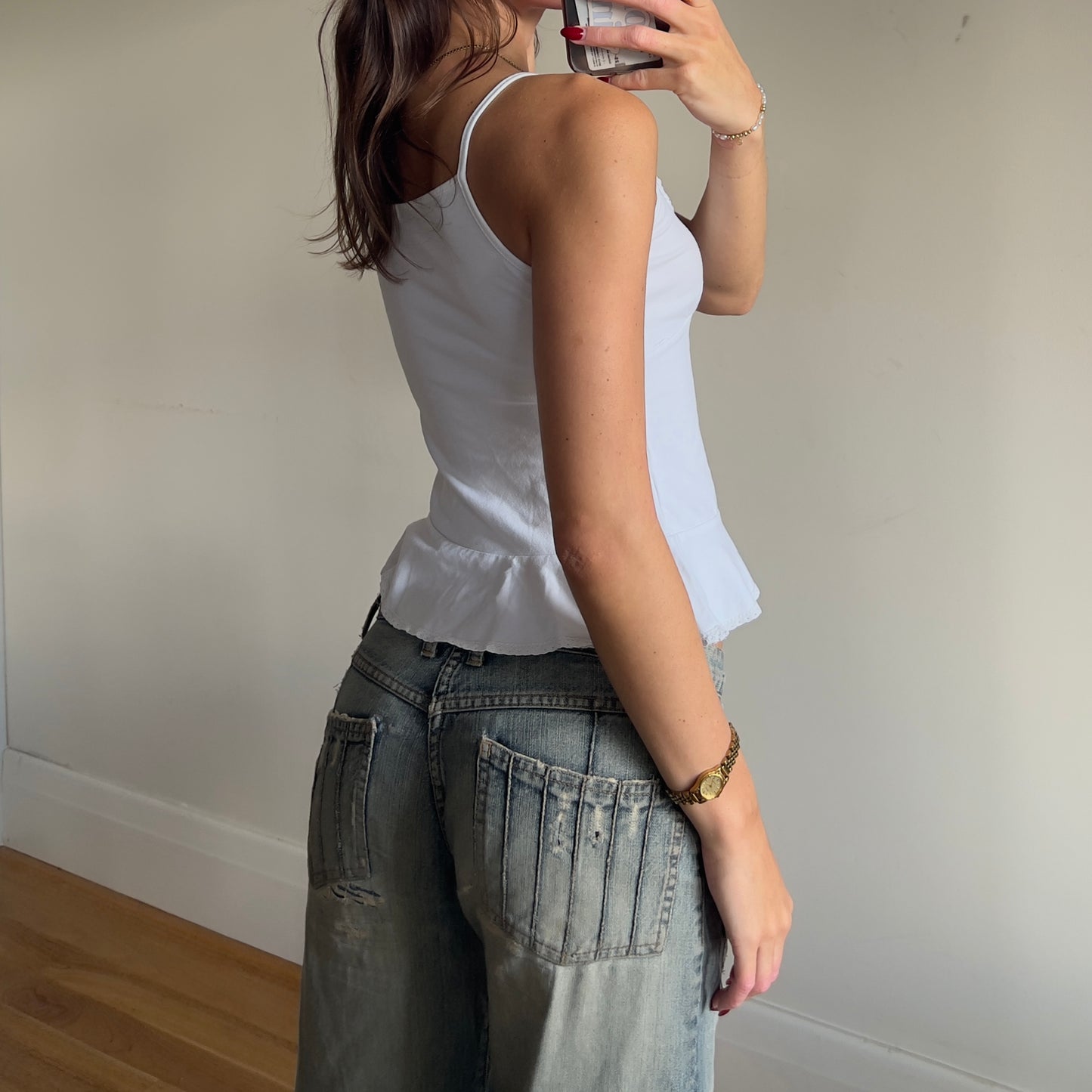white frilly cami