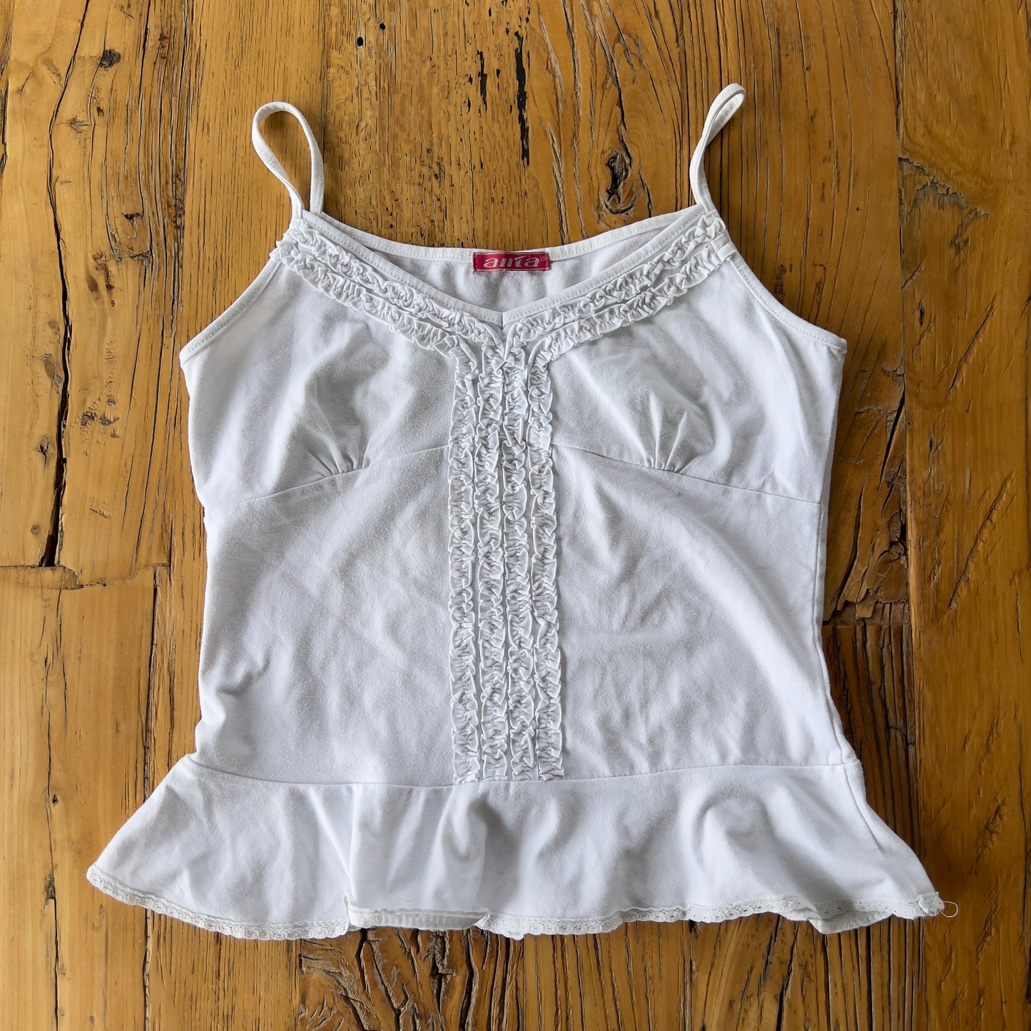 white frilly cami