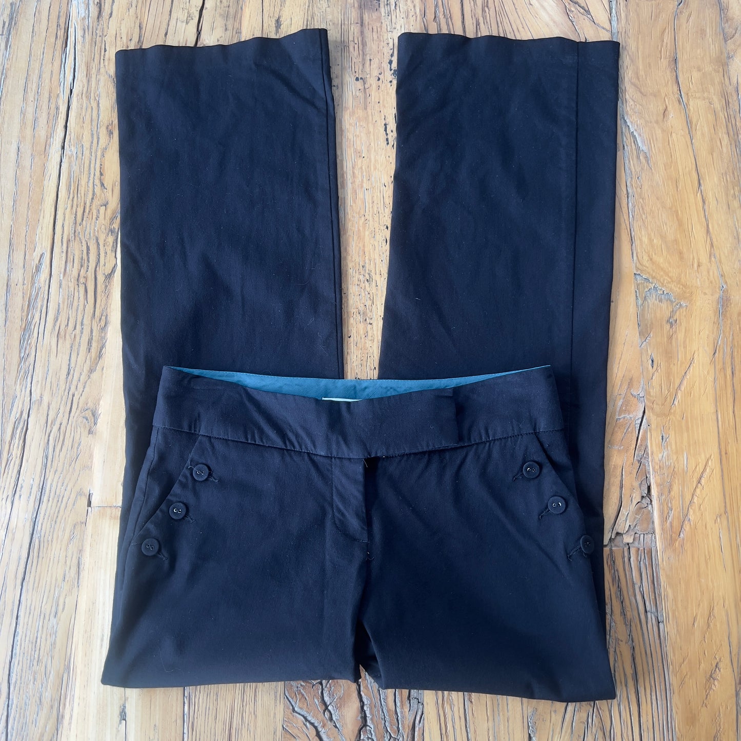 black low rise trousers