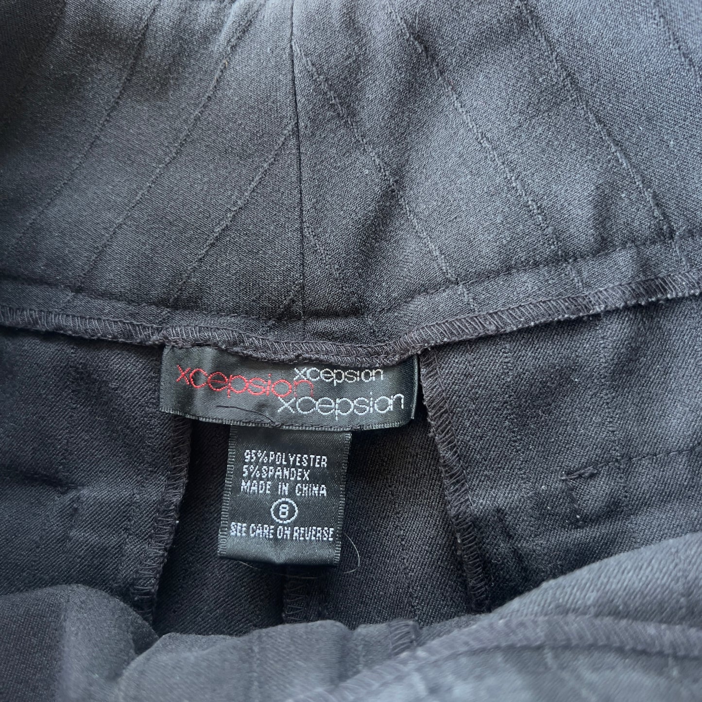 black pinstripe trousers