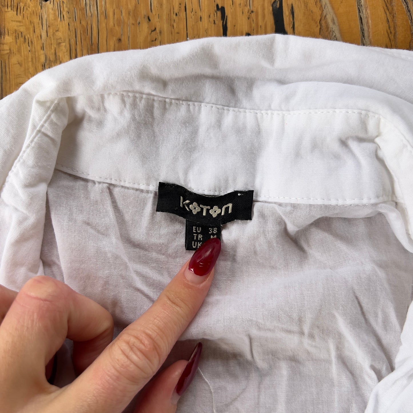 white ruched button up shirt
