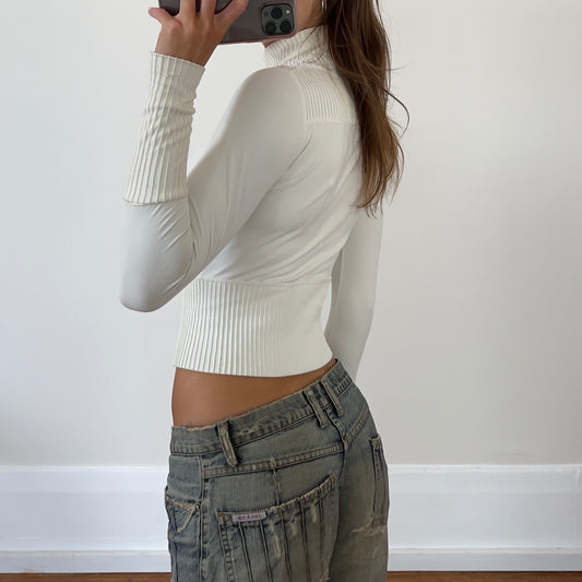 white zip up jacket