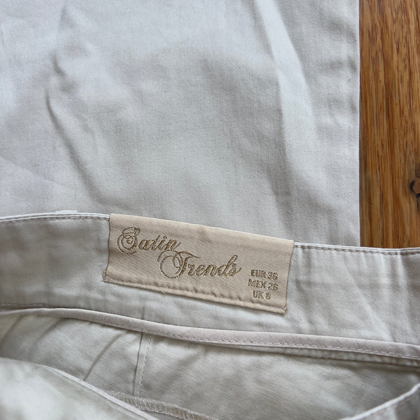 low rise flared beige trousers