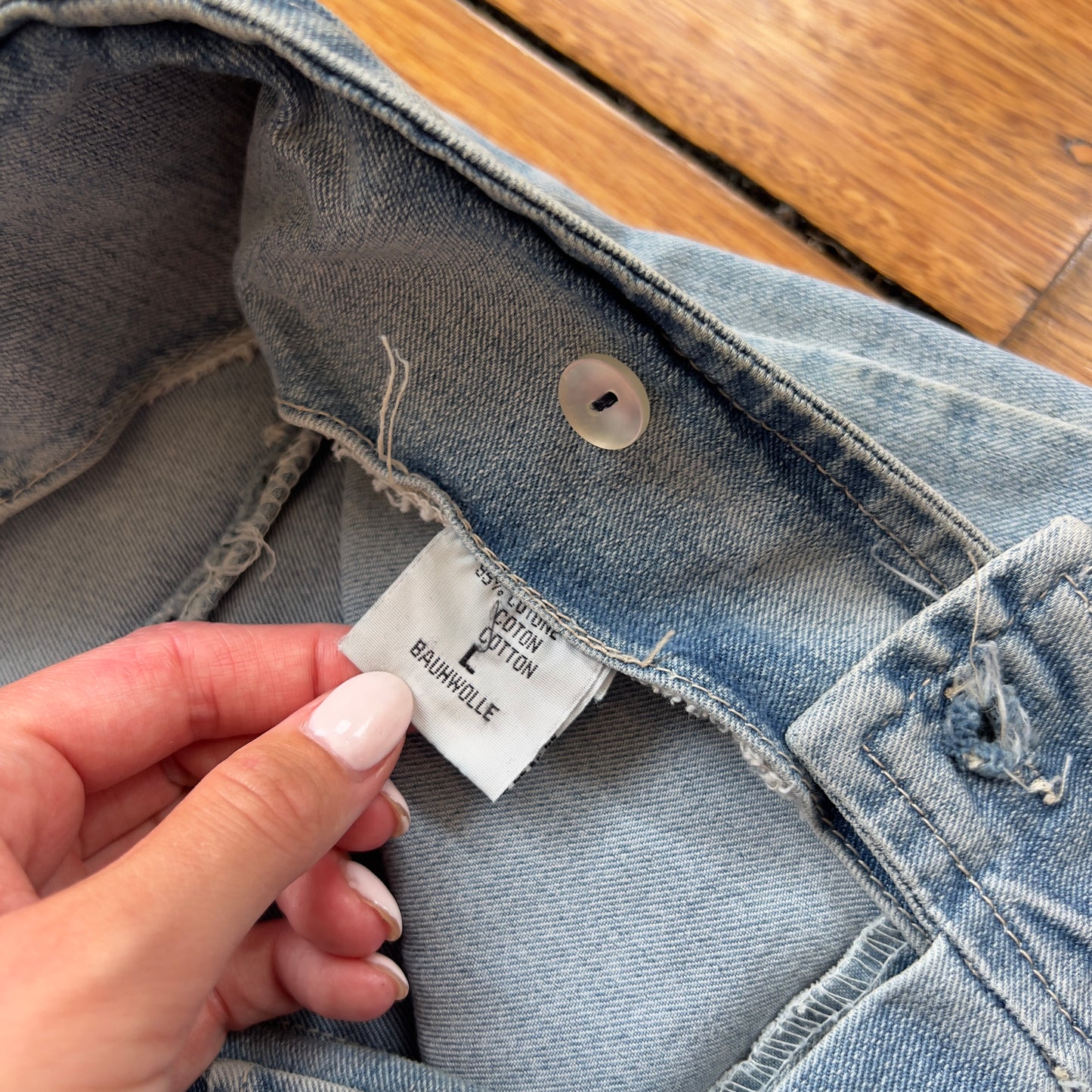 low rise flared buckle jeans
