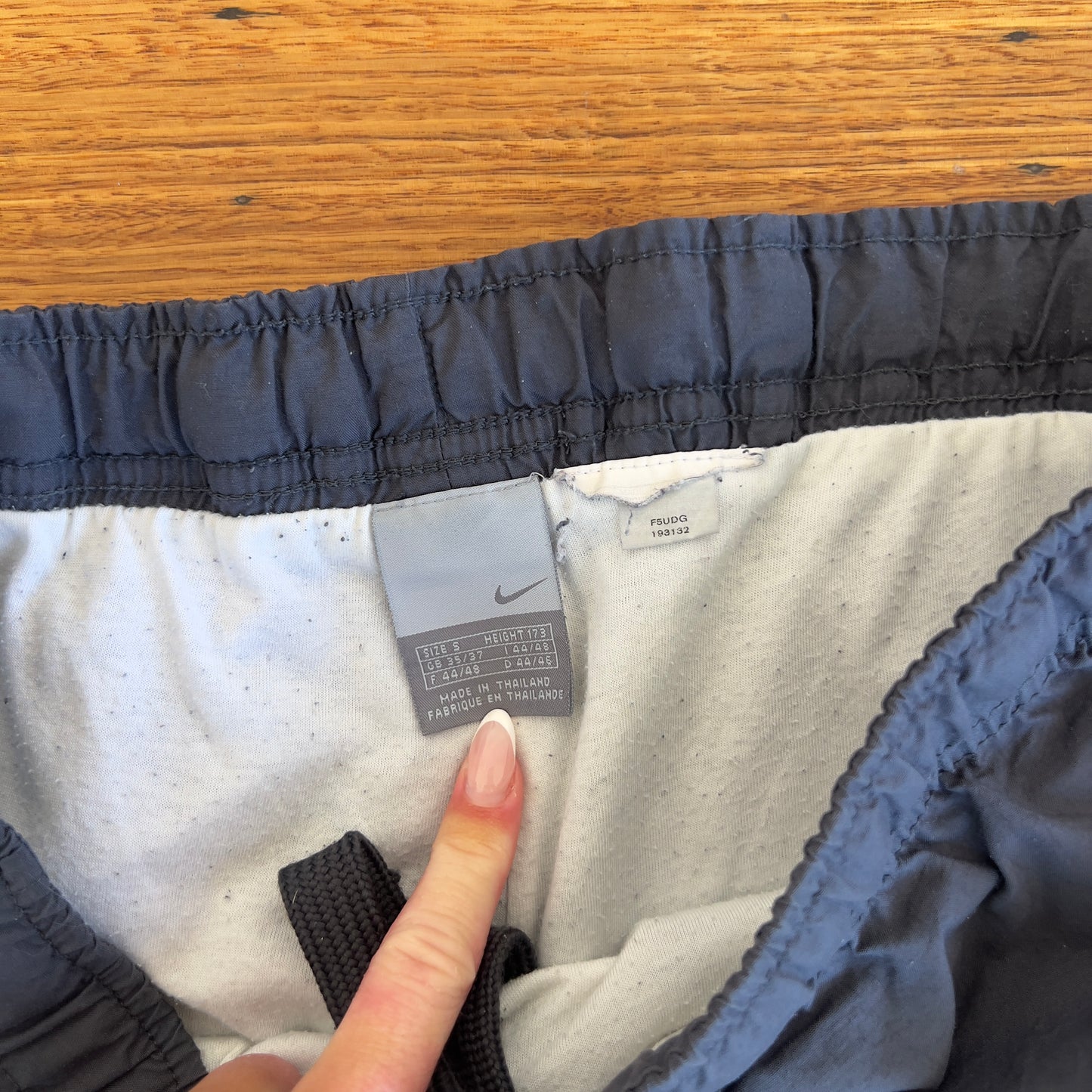 grey Nike track pants