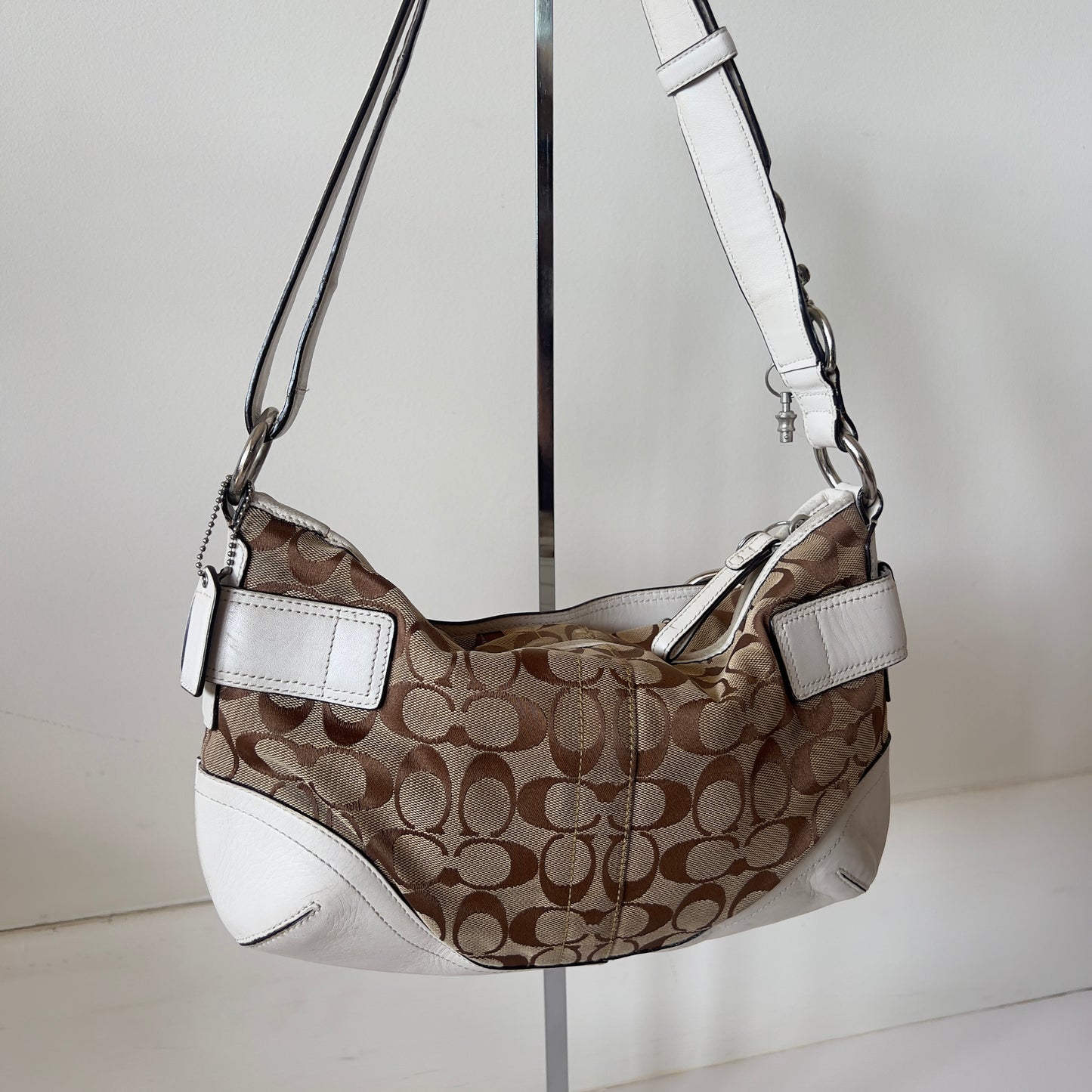 white signature Coach bag