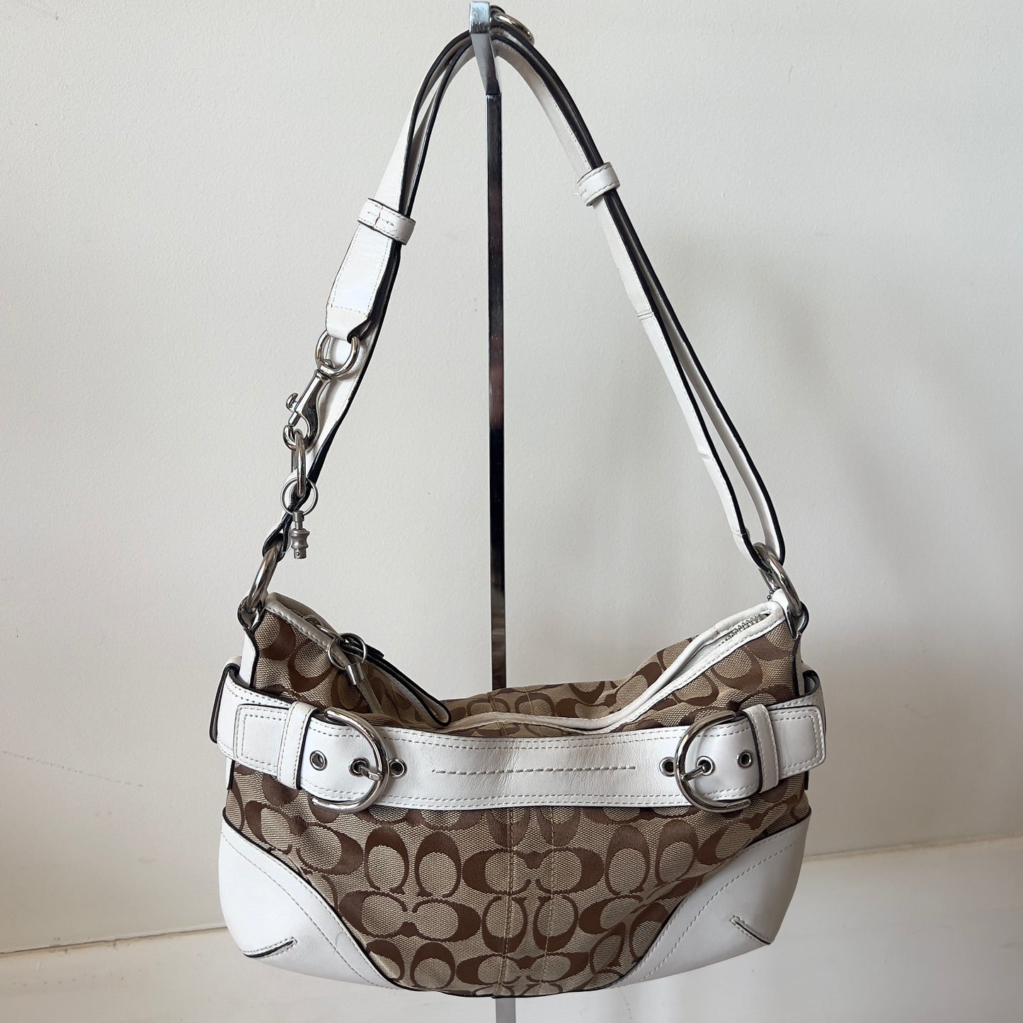 white signature Coach bag