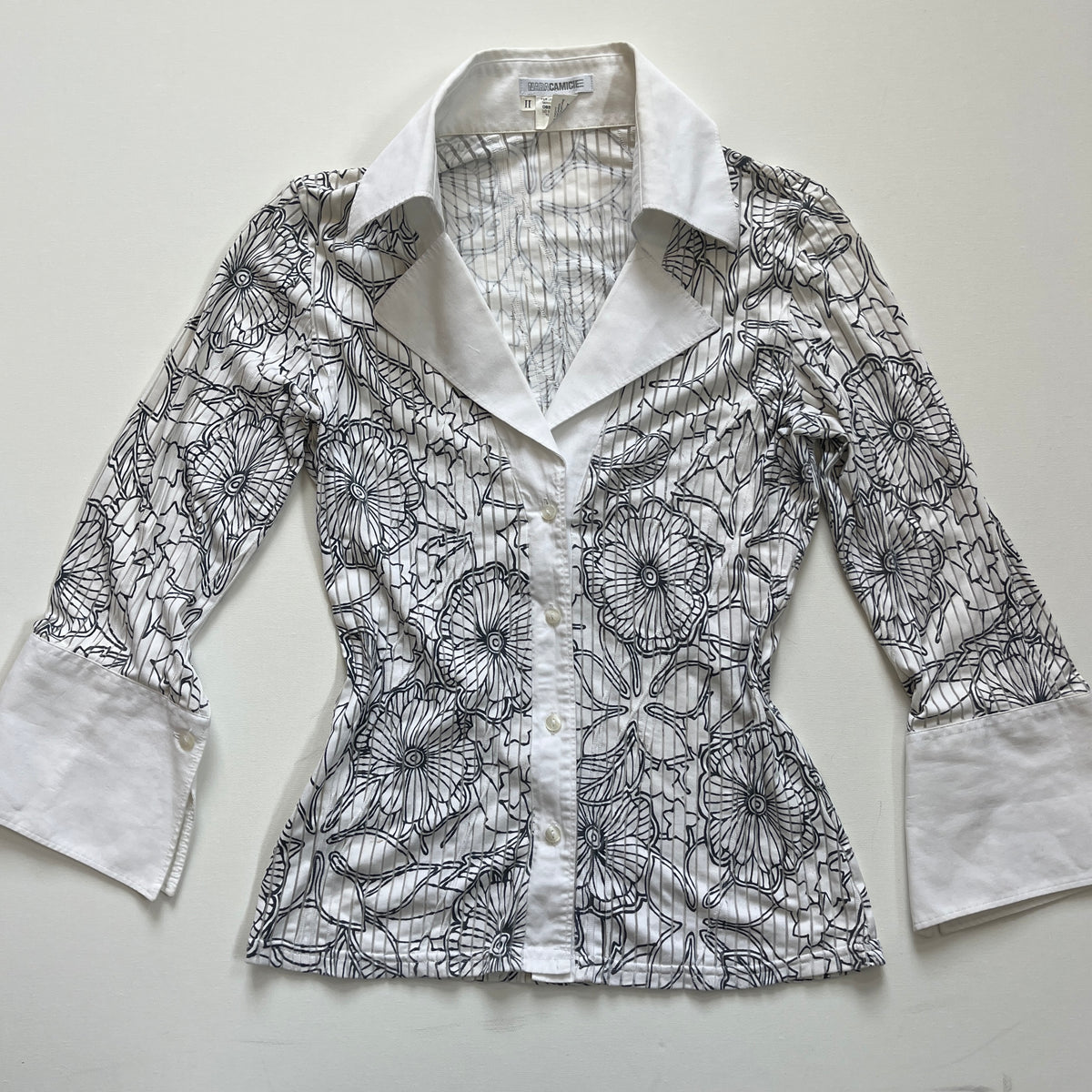 white graphic button-up shirt