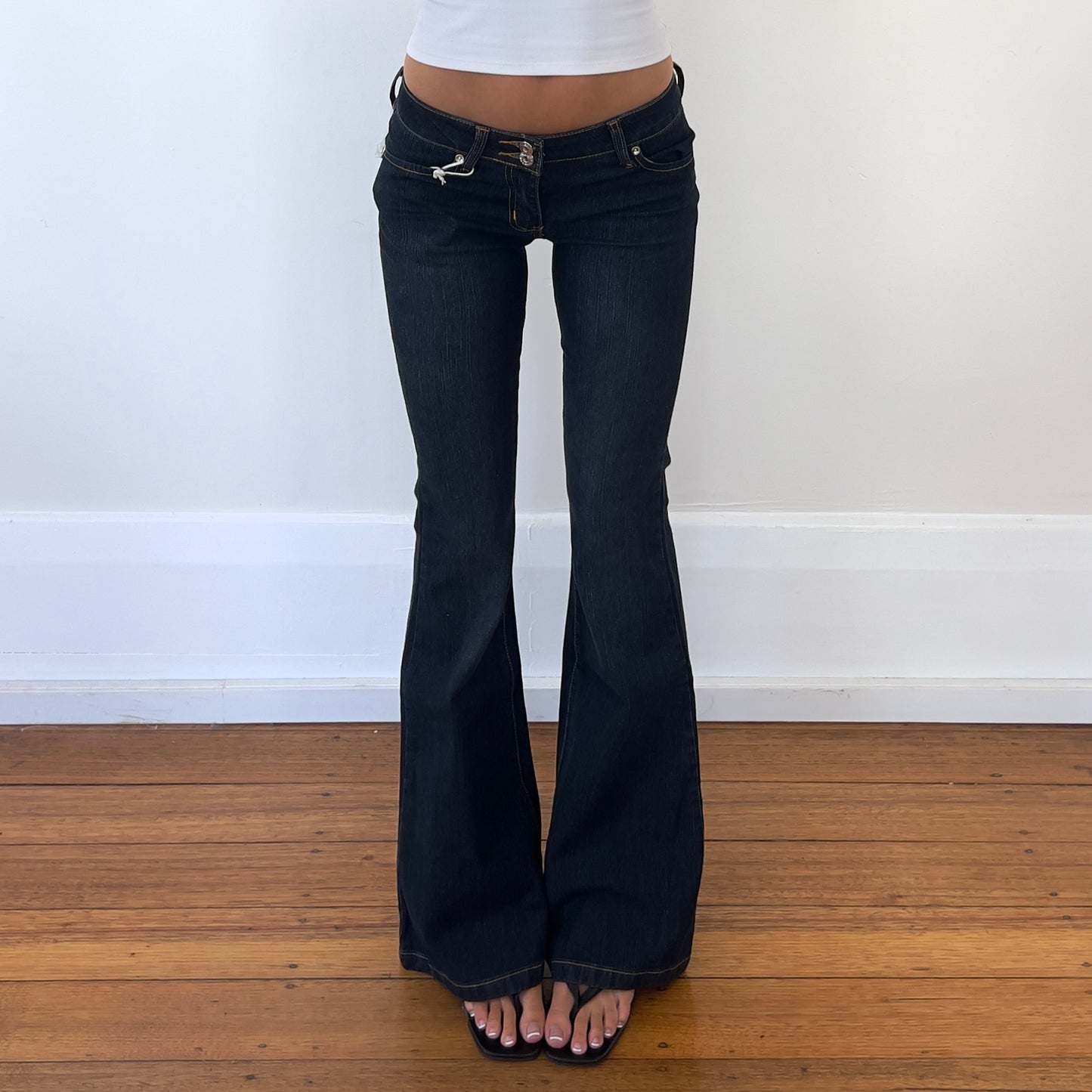 low rise flared Face Off jeans