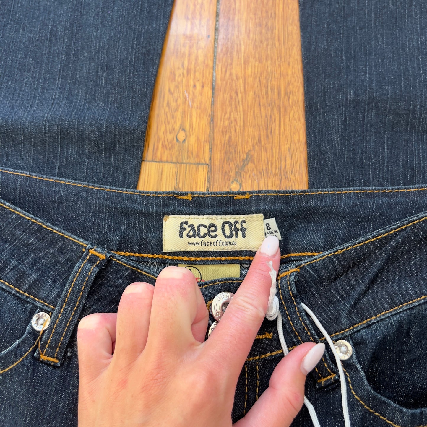 low rise flared Face Off jeans