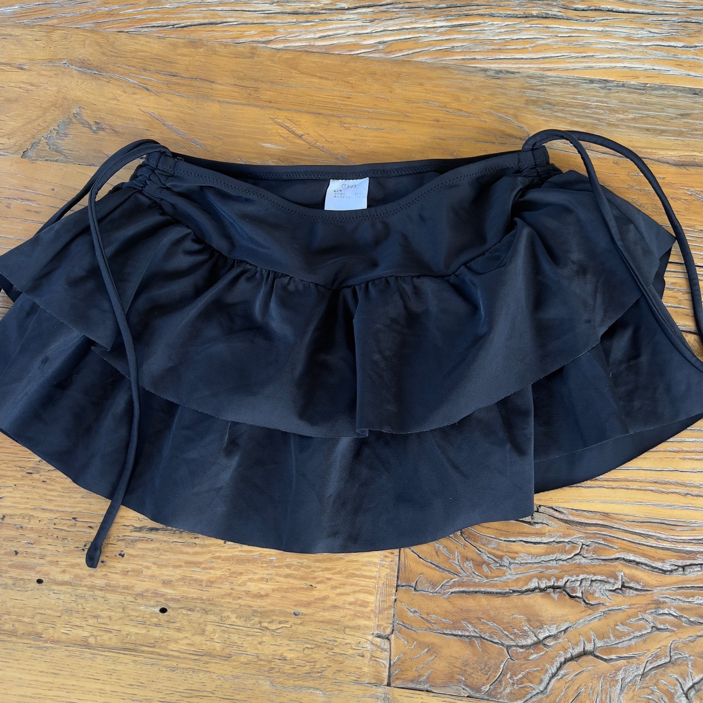 black frilly mini skirt