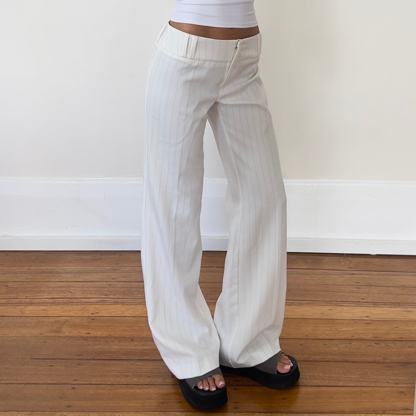 white pinstripe trousers