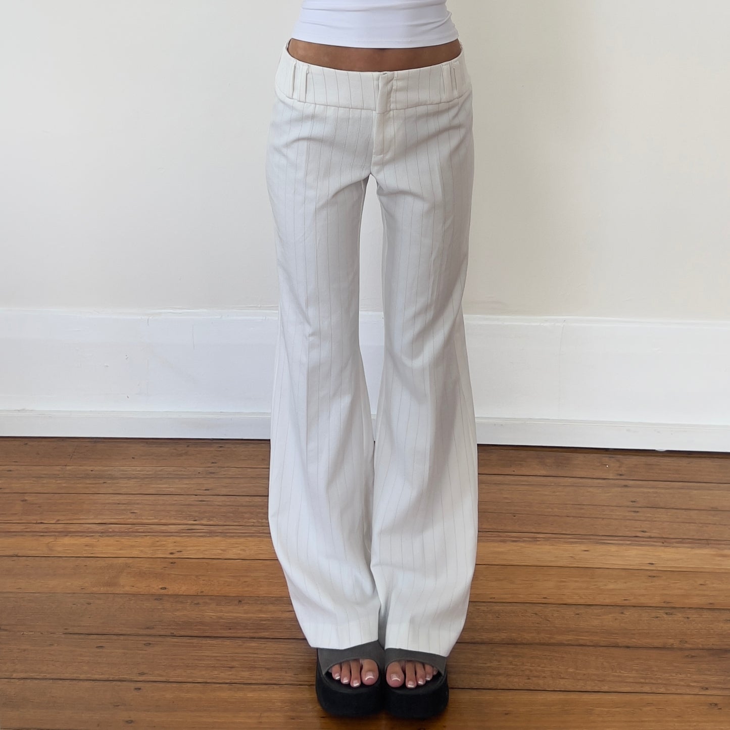 white pinstripe trousers