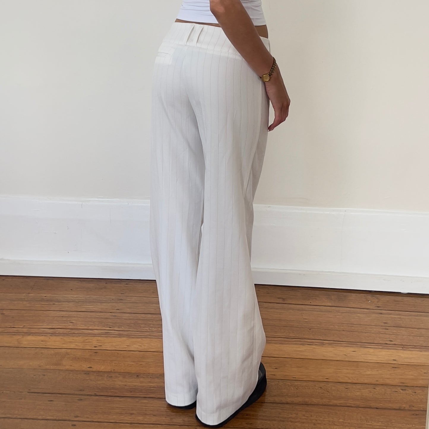 white pinstripe trousers