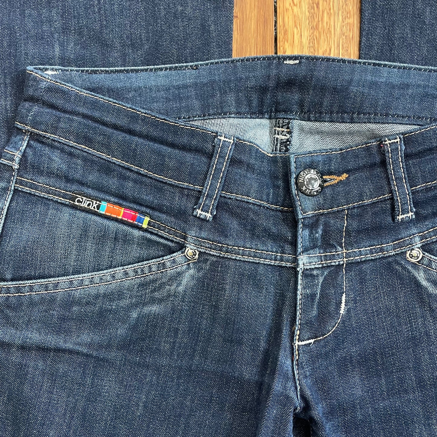 dark denim low rise flared jeans