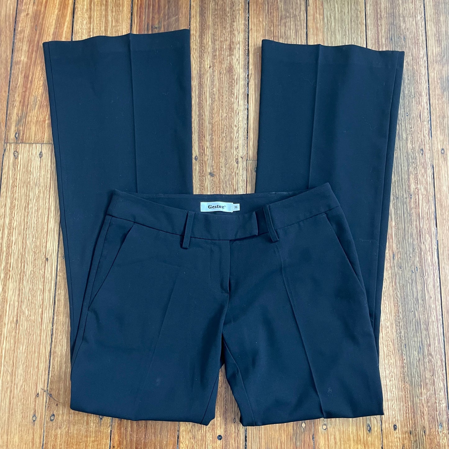 black low rise trousers