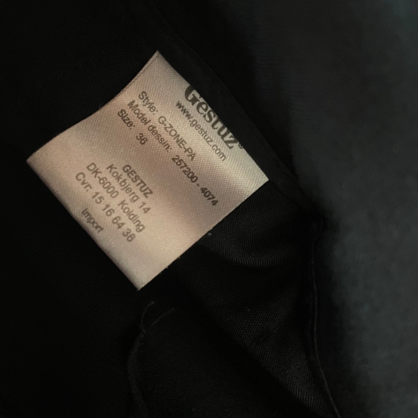 black low rise trousers