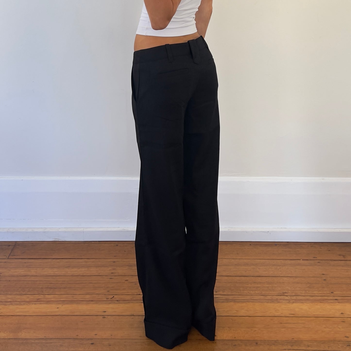 black low rise wide leg trousers