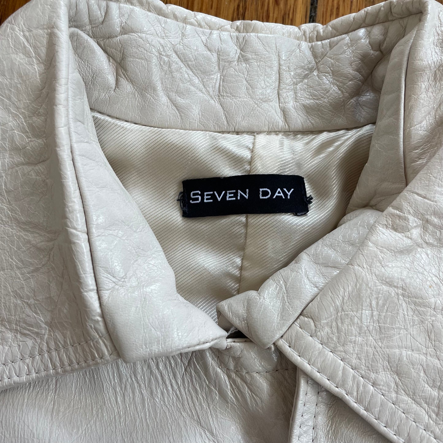 cream leather trench-style jacket