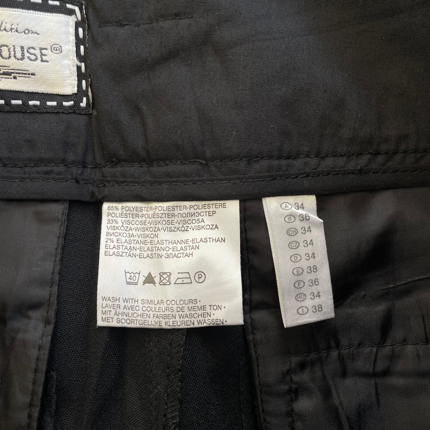 black low rise trousers