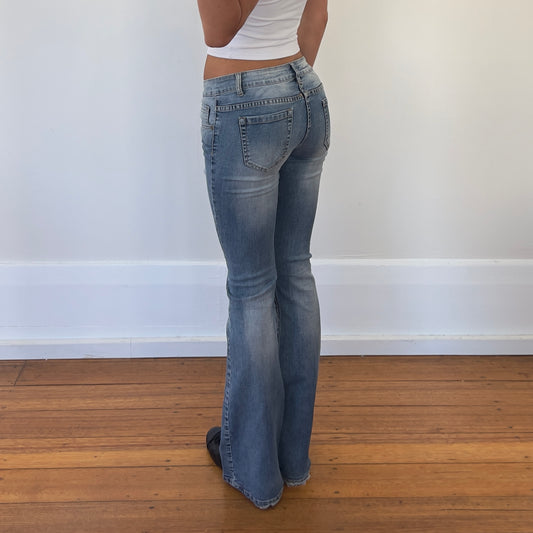 low rise bootcut ripped jeans